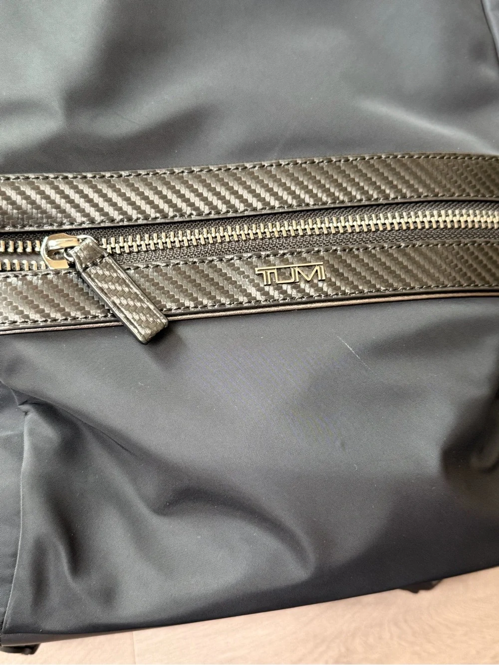 TUMI Monroe Foxwood Black BackpackCarbon Fiber Accents